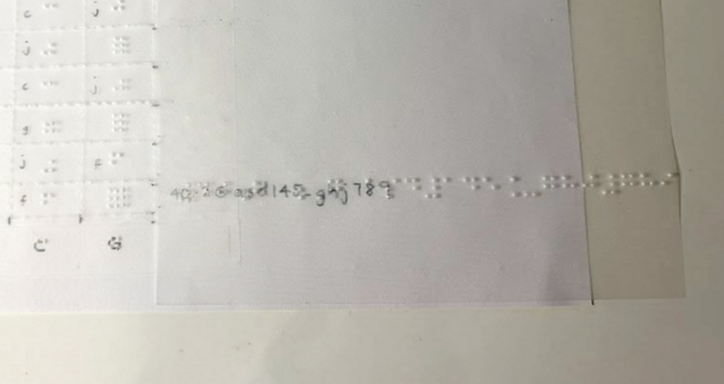 The braille text for a row extends beyond the A3 sheet of paper.