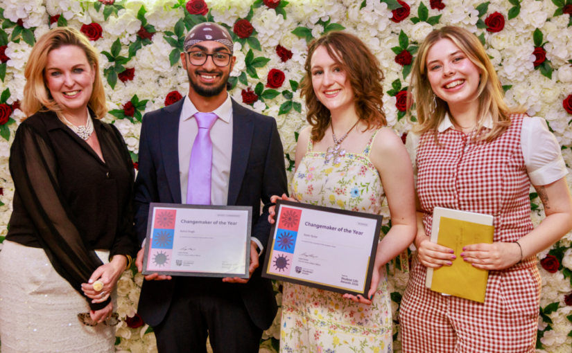 The blog author Susie Symes poses in a line with fellow students and representative from the University of York. Susie is holding her Changemaker of the year award certificate